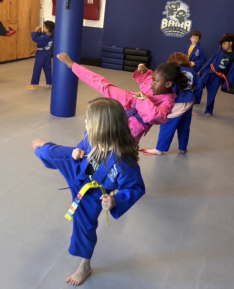 Kids practicing kicks in class at Bay Area Martial Arts in Oakland