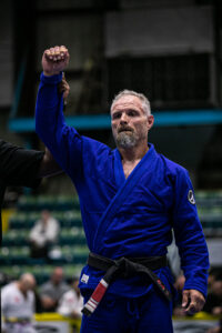 Adult martial arts student after training at Core Combat Sports in Rockford IL building discipline, resilience, and higher standards.