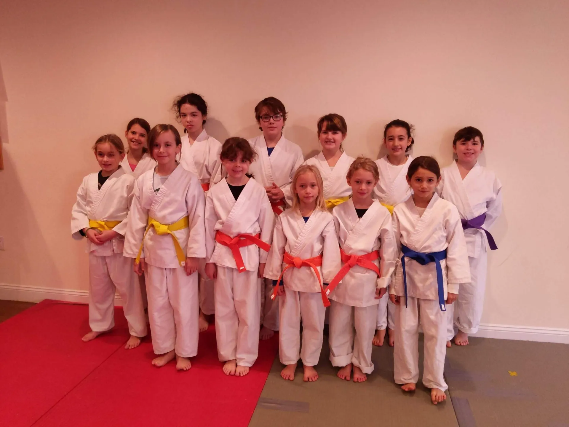 Group of kids martial arts students in uniforms at International Martial Arts Center in Manhattan