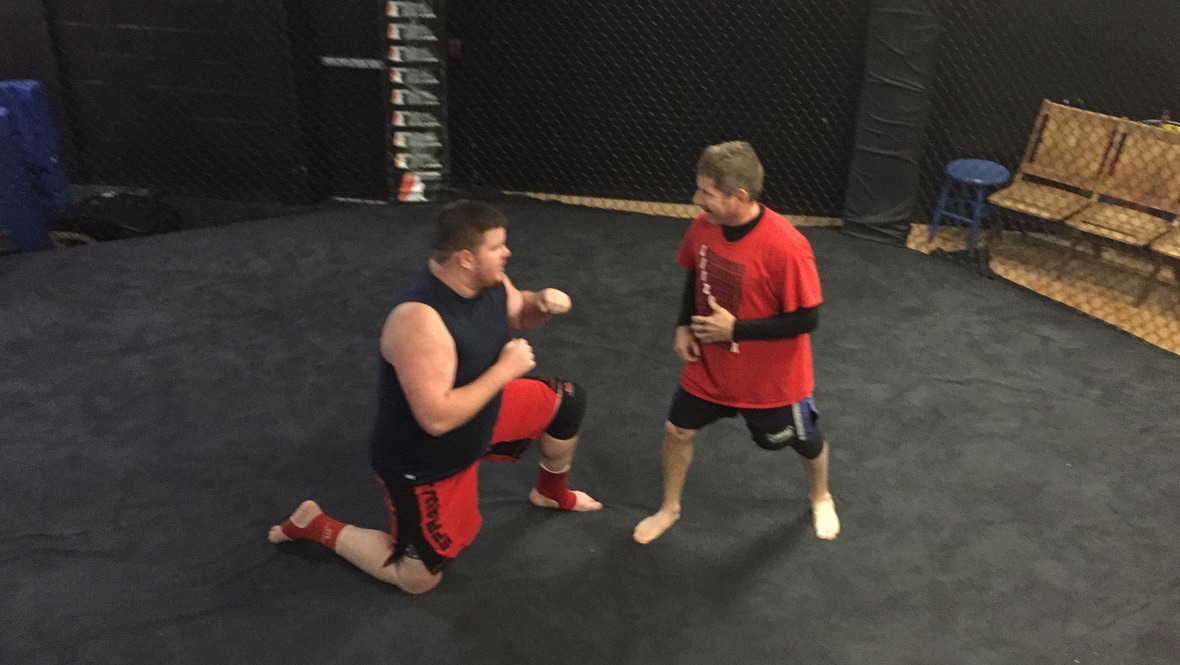 Will Crockan and John Payne squared up on the mat at Lauzon MMA