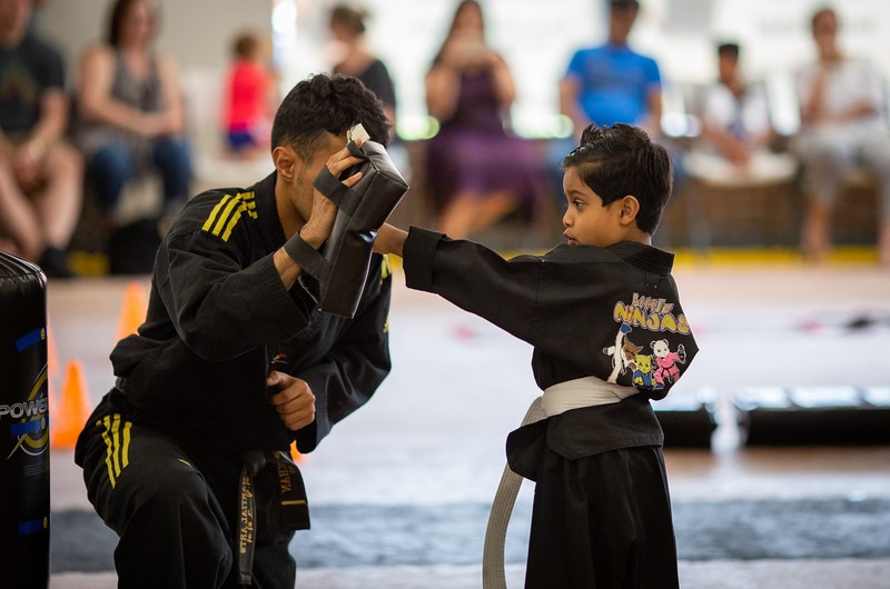 A Little Ninjas student practicing with an instructor at U.S. Elite