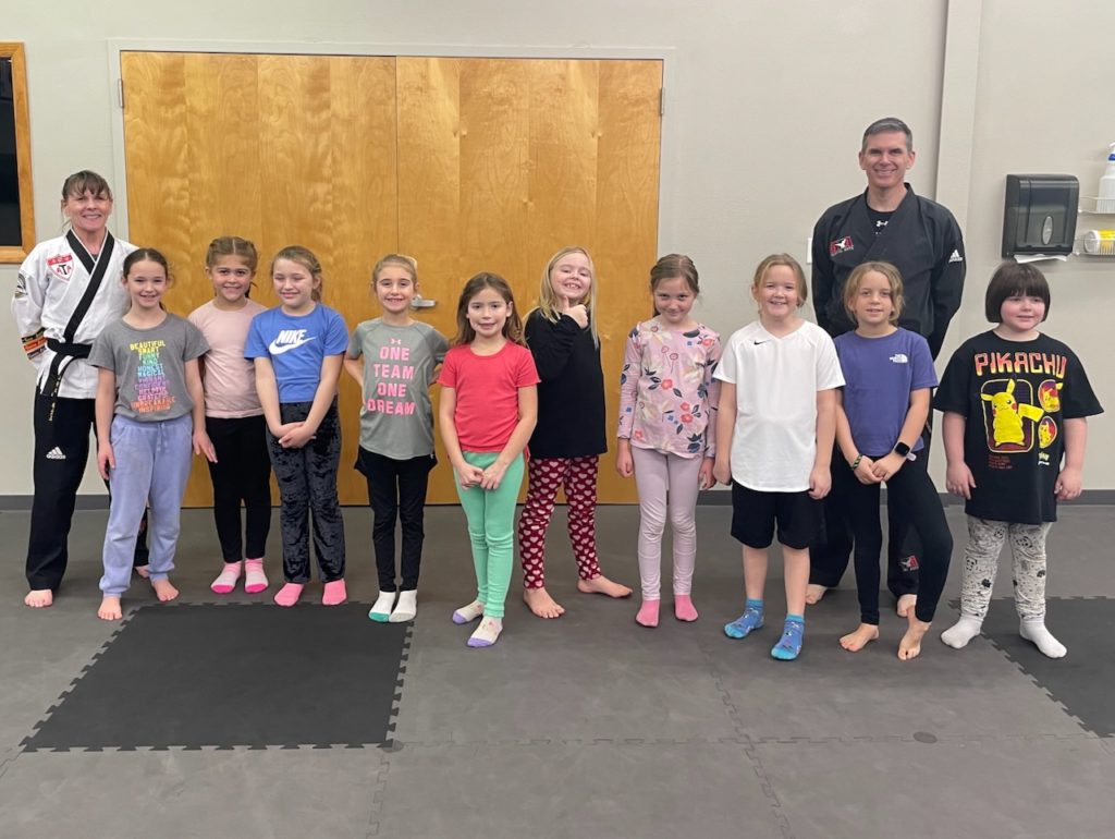 Group of kids at a Triumph Martial Arts self defense workshop