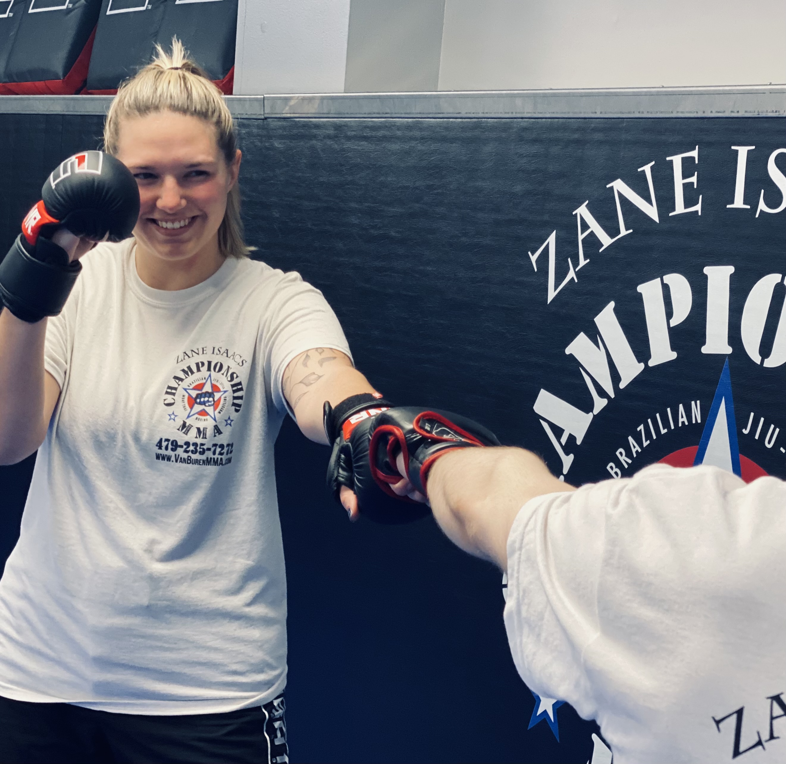 Adult student practicing a glove drill at Championship MMA